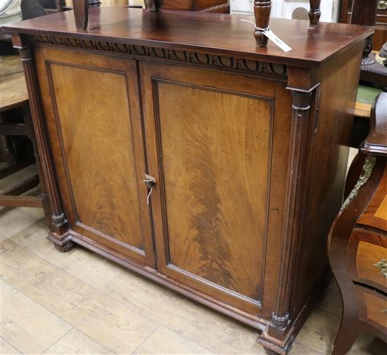 A mahogany two door cupboard W.117.5cm